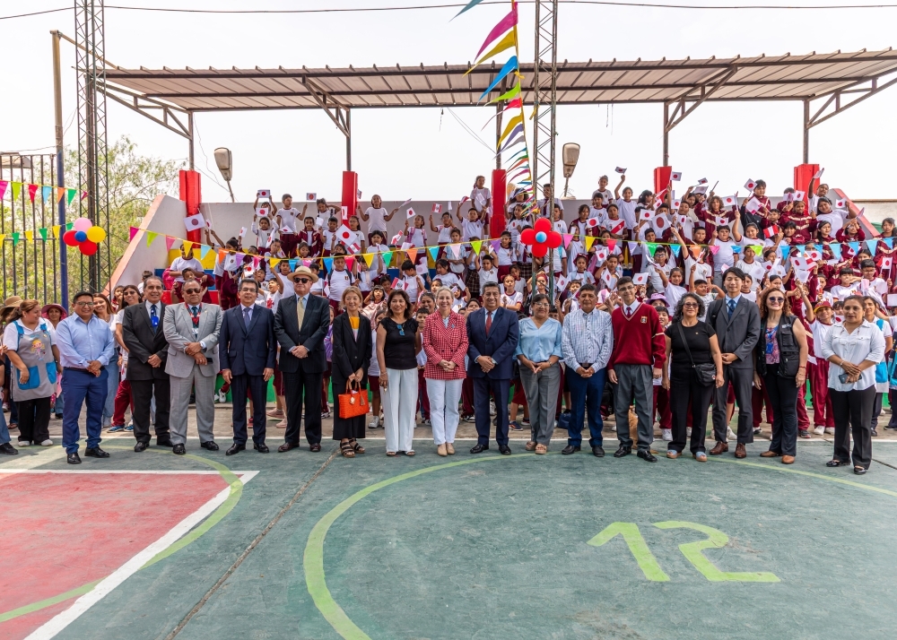 Los asistentes tomándose una foto grupal