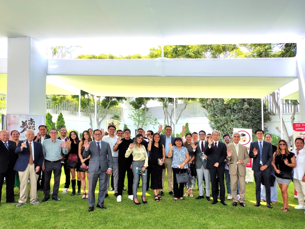 Fotografía grupal de los asistentes