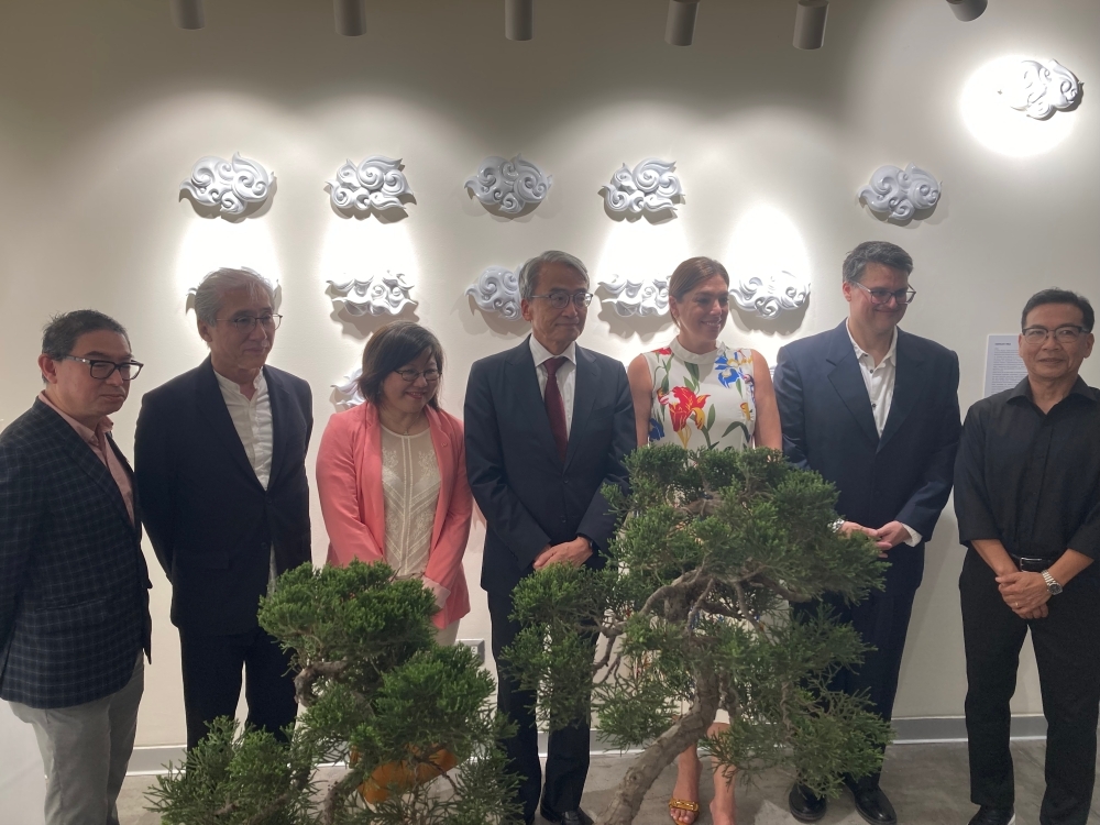 Los participantes del evento toman una foto grupal.